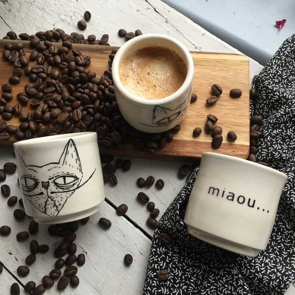 espresso handmade ceramic cup with a grumpy cat design