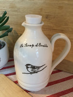 Jug for maple syrup with a bird, inscription "Le Pichet à Sirop du Chalet".