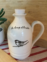Jug for maple syrup with a bird, inscription "Le Pichet à Sirop du Chalet".