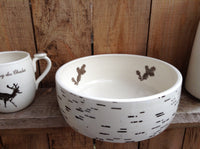 service or cooking bowl with a birch design and deer for the chalet.Baking dish.