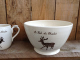 Salad bowl for service with a deer or a moose as a design with french inscription "le bol du chalet