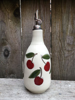 Bouteille d’huile ou vinaigre avec motifs de cerises. The Oil  or Vinegar Bottle cherries