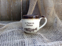 The fisherman's mug. french pottery.Made of porcelain.Vintage look.