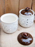 Garlic cellar with a birch pattern. keep your garlic longer,  with this pot with three holes. Made of porcelain in Quebec