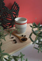 Espresso cup handmade Pottery With grey and red socks pattern.