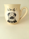 Pug dog mug, made of hand-trowned porcelain. Dog design with an inscription "Wouf" left handed or right handed available