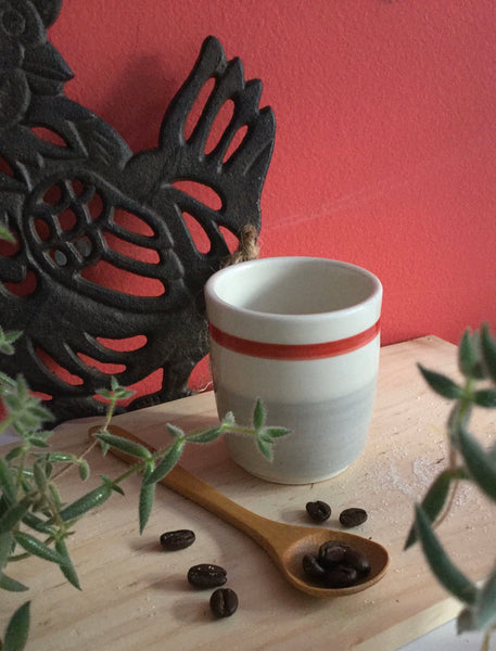 Espresso cup handmade Pottery With grey and red socks pattern.