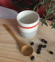 Espresso cup handmade Pottery With grey and red socks pattern.