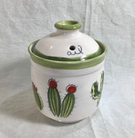 Garlic cellar with a cactus pattern. keep your garlic longer,  with this pot with three holes. Made of porcelain in Quebec