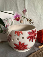 Small crochet or yarn bowl for crochet or knitting with an Red flowers